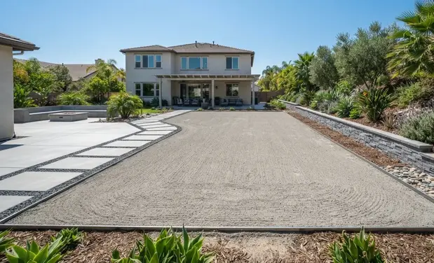 Professionally prepared artificial turf foundation with compacted aggregate base and precision grading before synthetic grass installation in the Inland Empire