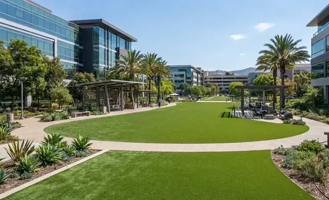 Commercial artificial turf installed throughout a modern office campus in the Inland Empire