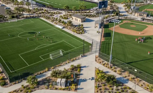 Championship athletic complex featuring football, soccer, baseball, softball, and training fields with professionally installed artificial sports turf