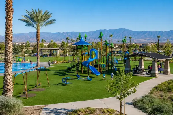 Safe playground turf installation with soft impact absorbing surface for children